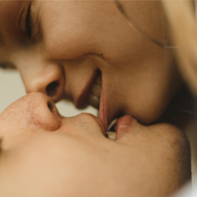 Two adults kissing
